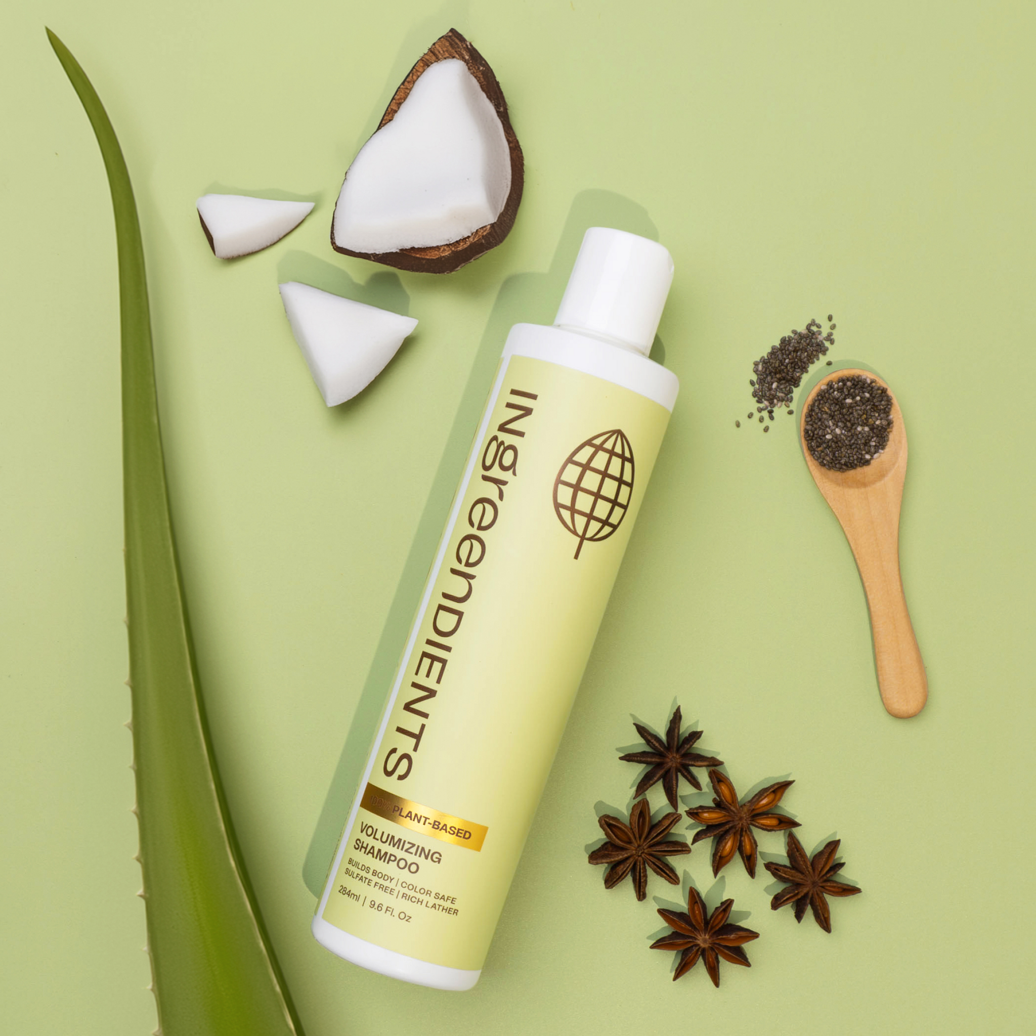 Icons or graphic detailing the cleansing action and volume benefits of the shampoo