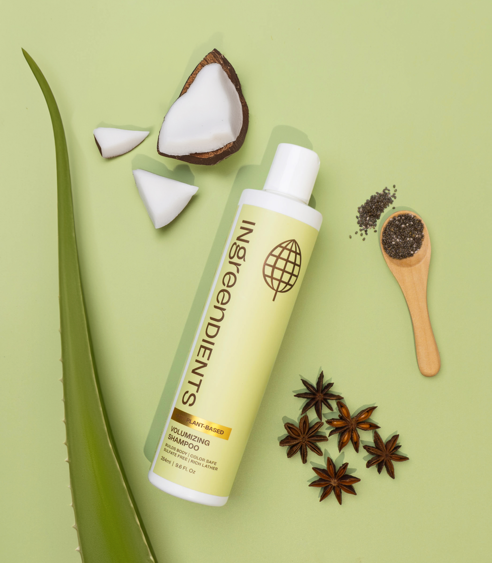 Icons or graphic detailing the cleansing action and volume benefits of the shampoo