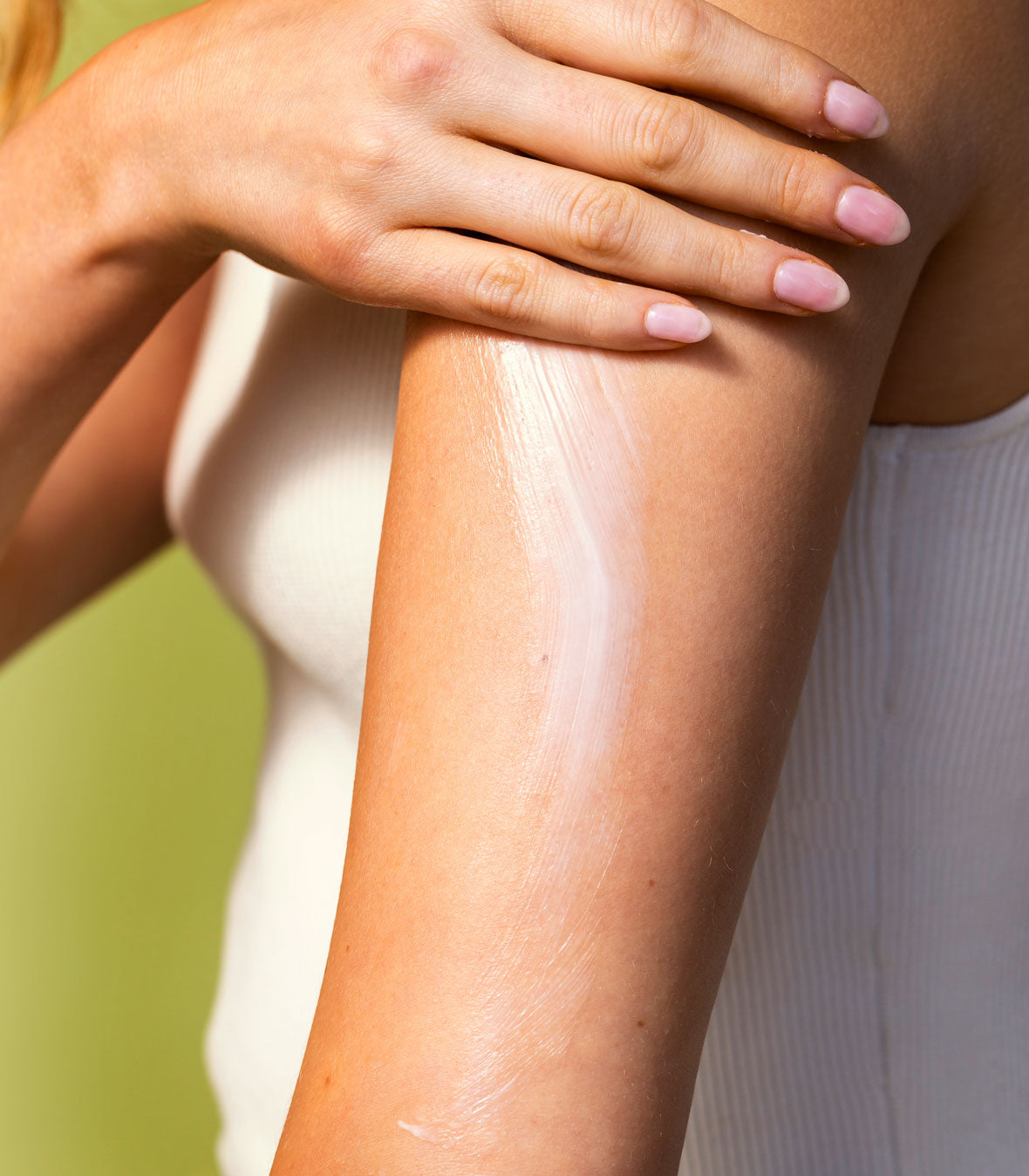 Angled view of the Nourishing Body Lotion bottle, focusing on the label
